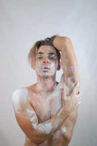 Photo of a man covered in permanent male enlargement powder